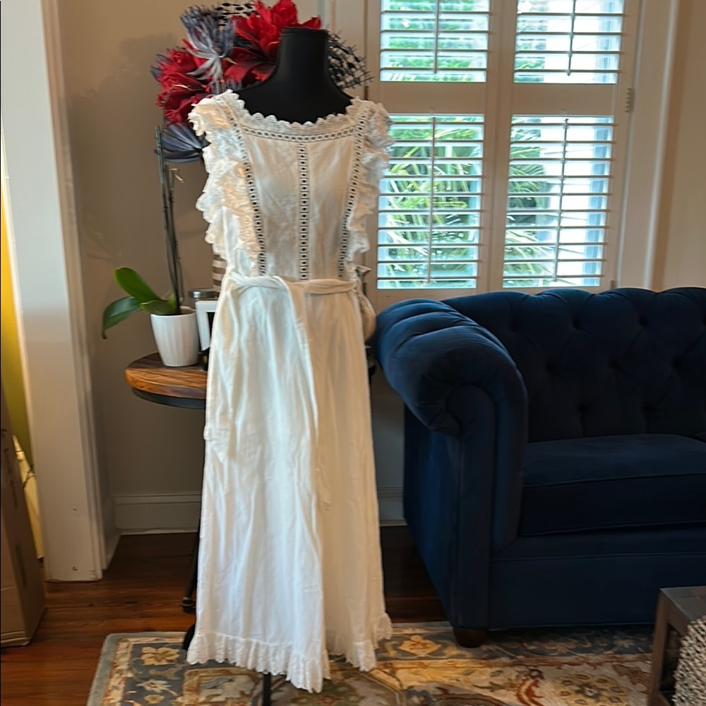 White Ruffled Wide-Leg Jumpsuit with Romantic Details